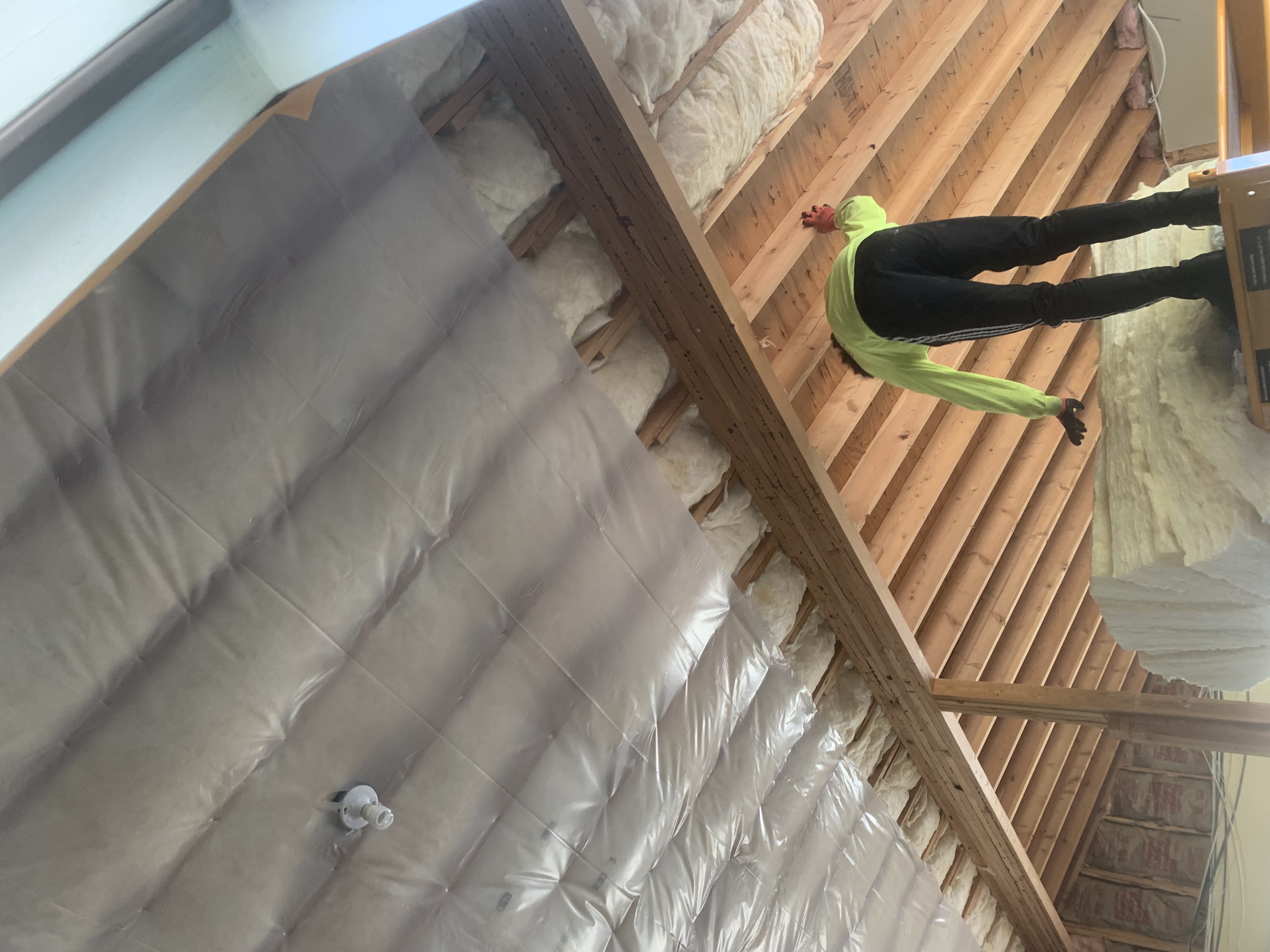 Palencia Insulation worker preparing insulation removal in Aurora, CO